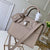 City Steamer Mini Bag In Grainy Calfskin M53804 Grey Collection